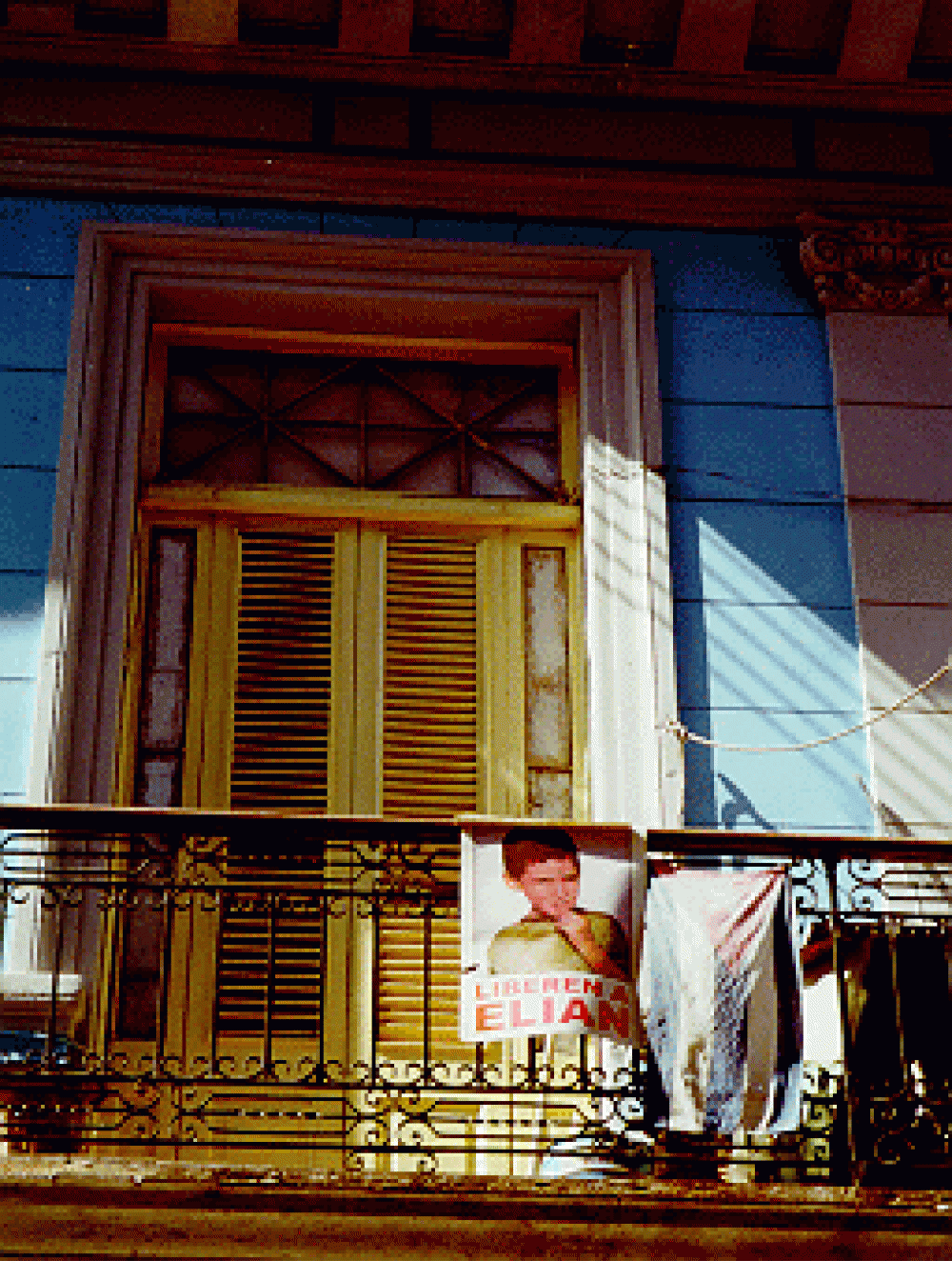 "Free Elian" poster in Havana window, February, 2000. 	