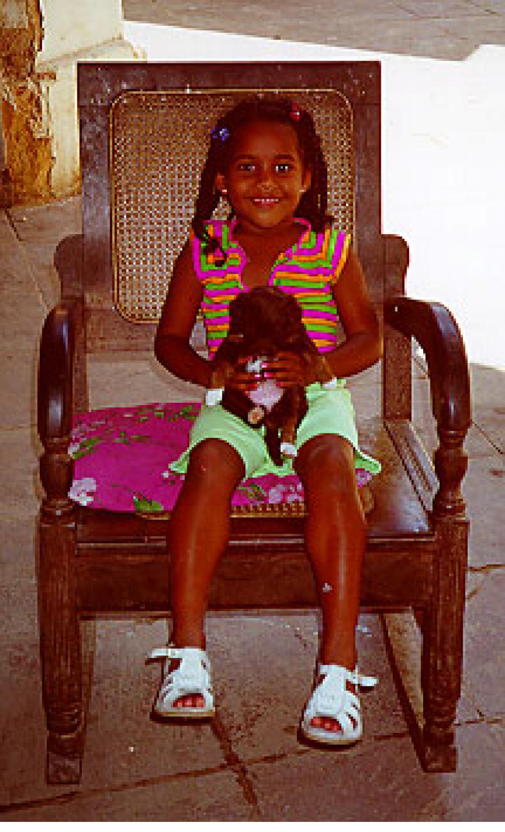 Girl with puppy. Trinidad, Cuba.