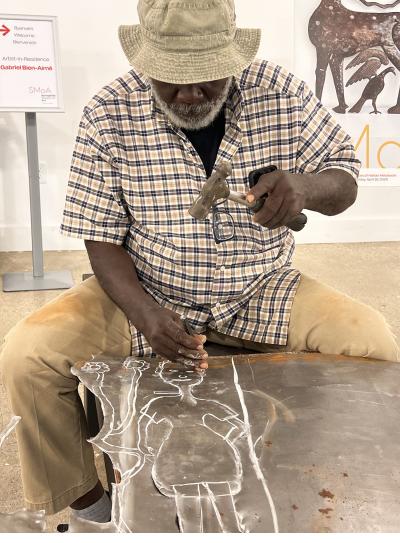 Gabriel Bien-Aimé at work at SMoA (photo courtesy of Regina Sansalone)