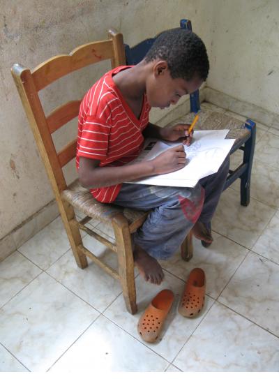 Artist at work at the ACFFC - Jacmel, Haiti. (Photograph © Anthony Hart Fisher, 2009)