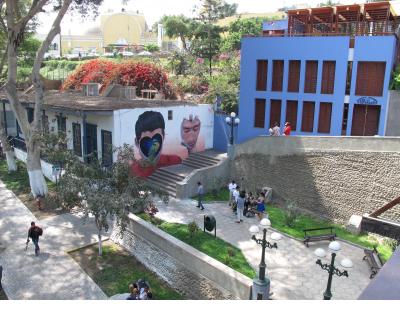 Mural by Jade Rivera dramatically situated on a stairway into the barranco of the Barranco neighborhood. Mural by Jade Rivera dramatically situated on a stairway into the barranco of the Barranco neighborhood.