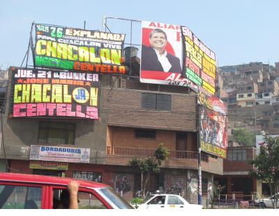 In this neighborhood near Claudio Jimenez's studio the dayglo lettering of the music posters blotted out even the political advertisements.