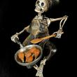 Drumsticks for the Dead - retablo figure