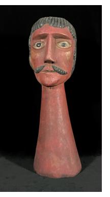 Gigante head with a mustache