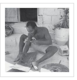 Gabriel Bien-Aimé in his workshop in Sapotille, Carrefour, Haiti, c. 1980 (from Alain Foubert - Forgerons du Vodou)