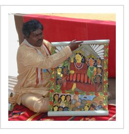 Bengali artist Gurupada Chitrakar sings the story of September 11th, 2001, in Santa Fe, July, 2006 (Photograph © Anthony Hart Fisher 2006).