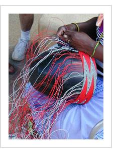 Detail of Jaheni Mkhize at work on a"soft basket".