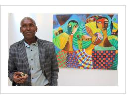 James Mbuthia at an exhibition at One Off Gallery, Nairobi (photo courtesy of Kenyan Arts Review).