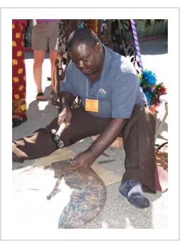 Michée Ramil Remy demonstrates his art in Santa Fe, NM, July, 2009 (Photograph © Anthony Hart Fisher 2009)