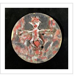 Horned Figure on a Cross