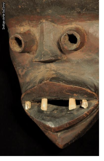 Dan Guere mask with animal teeth
