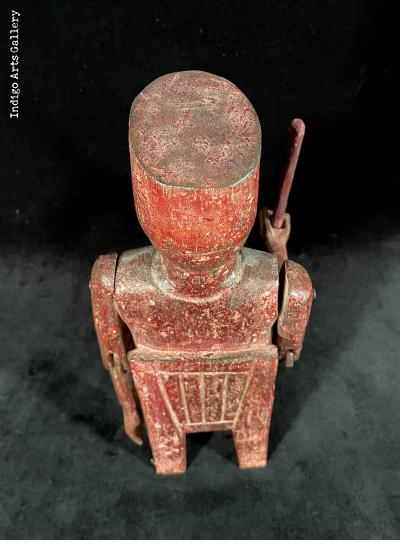 Seated Ajitz figure