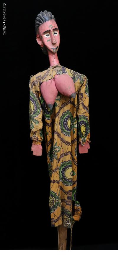 Bamana Rod Puppet of woman with articulated arms and breasts