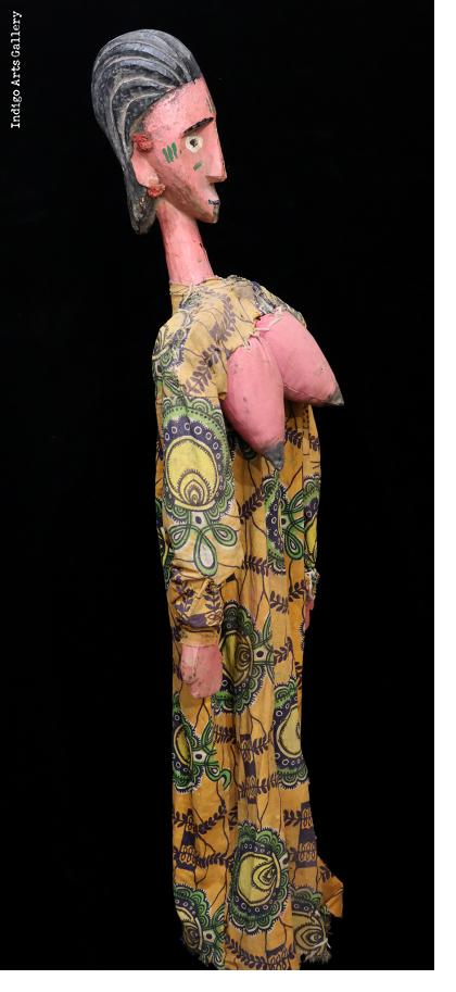 Bamana Rod Puppet of woman with articulated arms and breasts Bamana Rod Puppet of woman with articulated arms and breasts