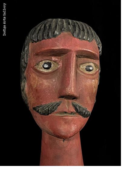 Gigante head with a mustache