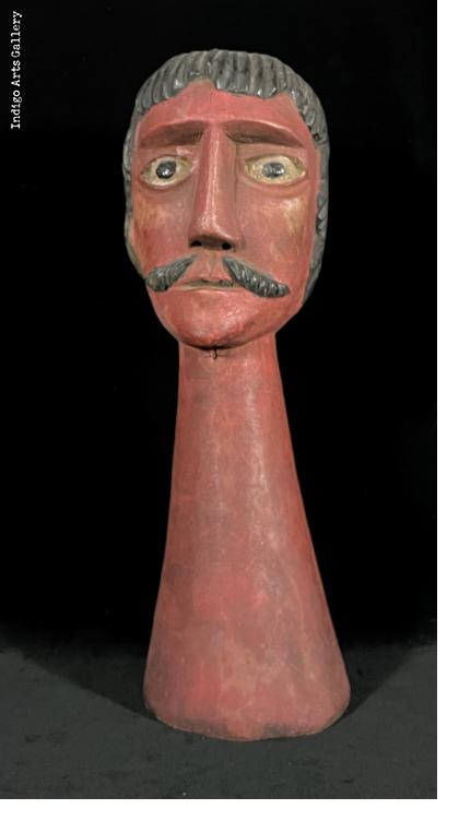 Gigante head with a mustache
