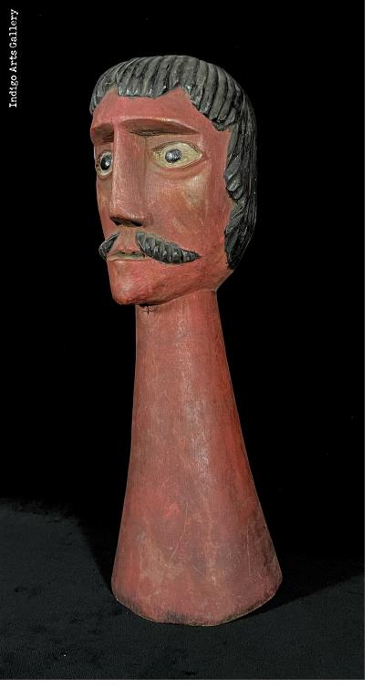 Gigante head with a mustache