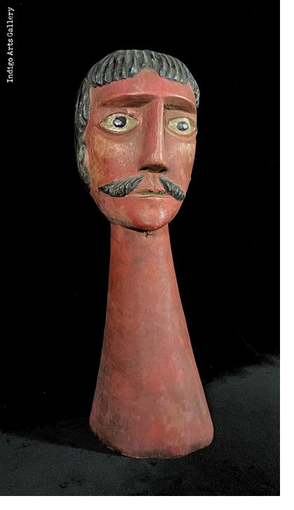 Gigante head with a mustache
