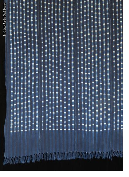 Indigo resist-dyed strip-weave cotton cloth