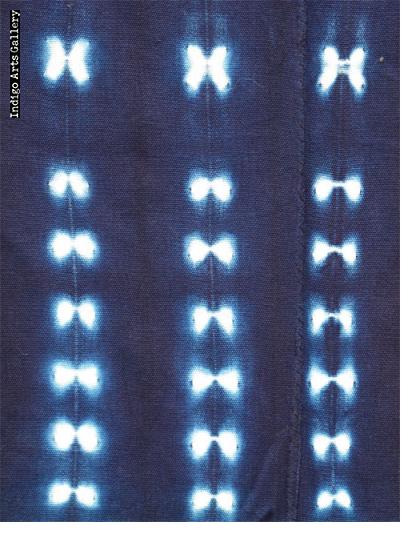 Indigo stitch-resist dyed strip-weave scarf